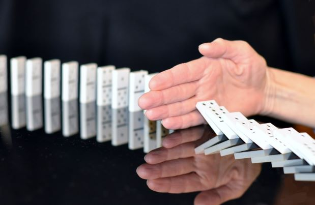 Stop the domino chain with a helping hand